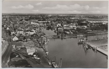 AK Foto Husum Nordsee Blick zum Außenhafen Luftbild 1960